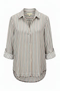 A long-sleeve button-up shirt with vertical stripes in pink, green, and white. Striped button-up shirt with rolled sleeves and a frayed hem.