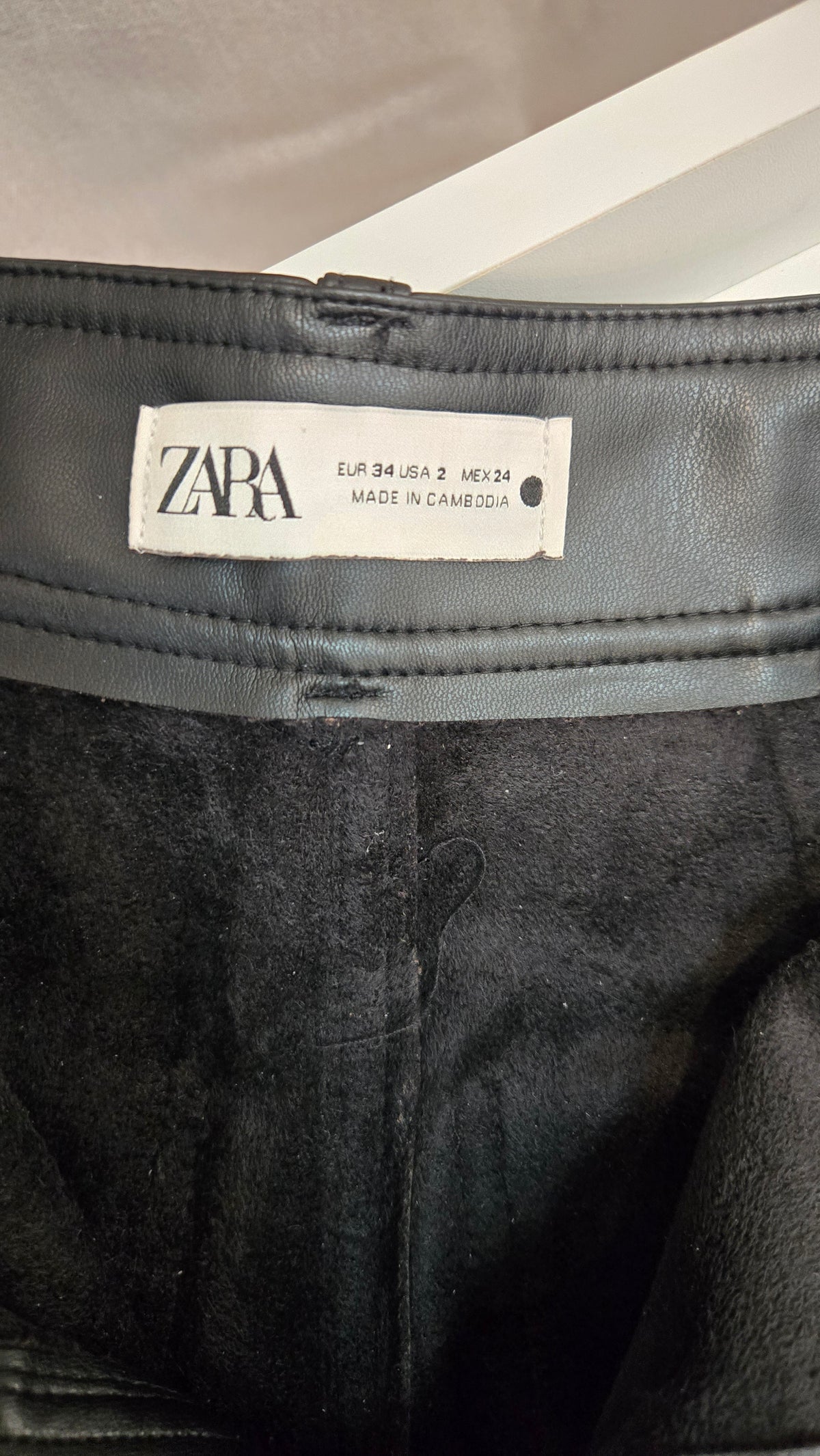 Black faux leather wide-leg cropped pants