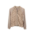 A beige long-sleeve bomber jacket with a floral lace overlay on the front.