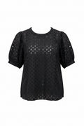A black short-sleeve blouse with a textured geometric eyelet pattern and sheer puff sleeves. 